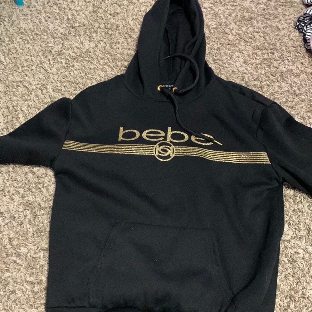 A black Bebe sport hoodie.